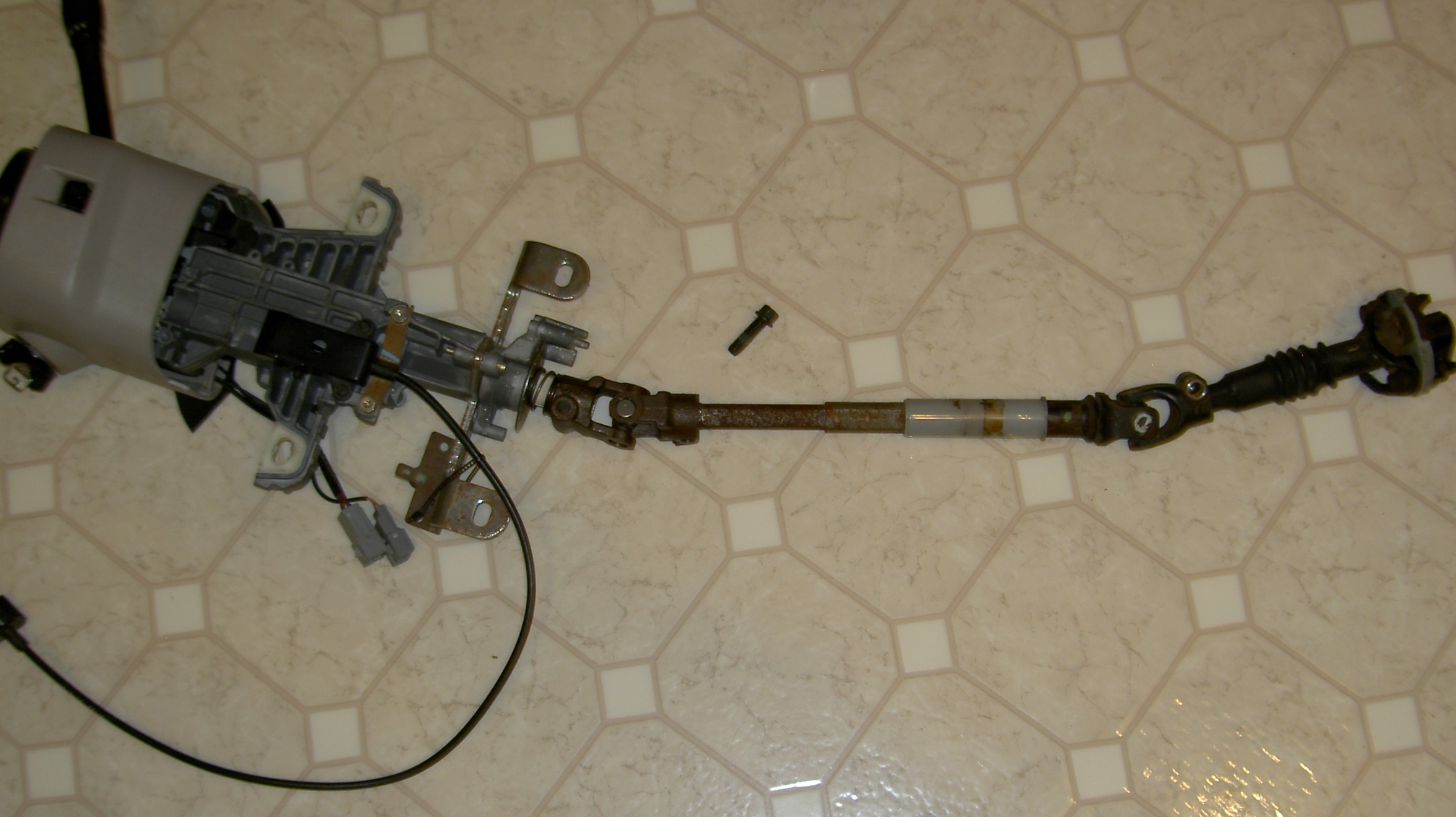 1991 column and both steering shafts.JPG