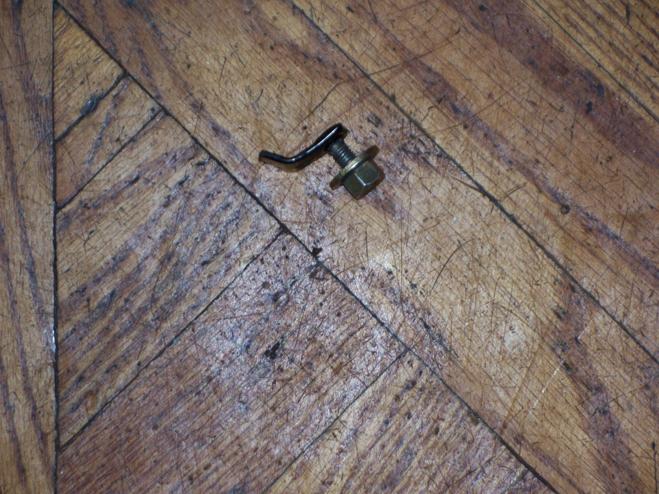 Broken tab from a sliding door track..JPG