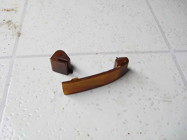 broken_plastic_tensioner.jpg