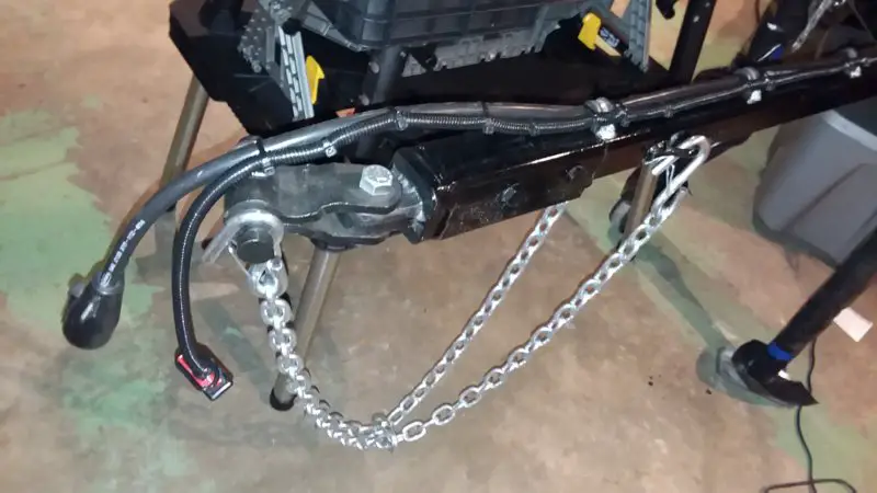 Chains & charge cable on tongue tube.jpg