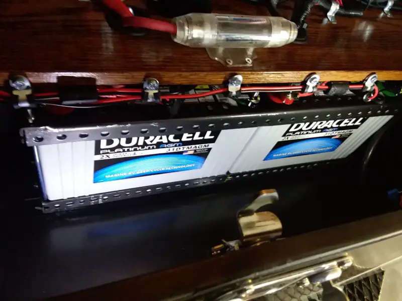 charger wire fastened to shelf.jpg