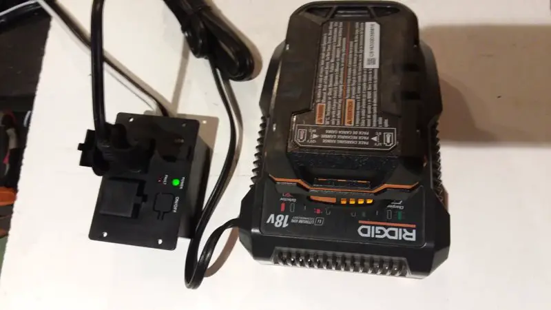 Inverter remote with batt charger in use.jpg