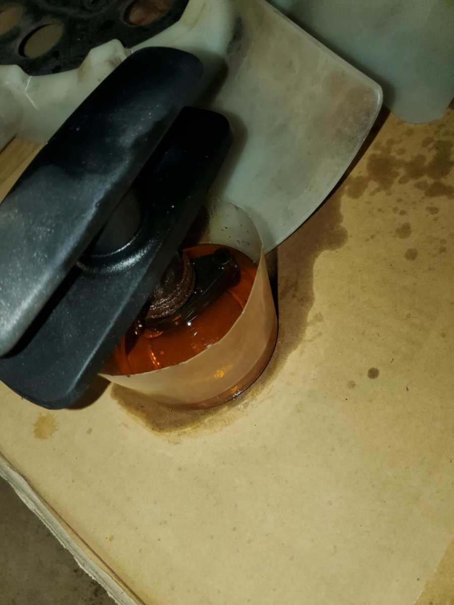 OldOEMHandleHandle_Rusty_SoakingInPenetrant.jpg