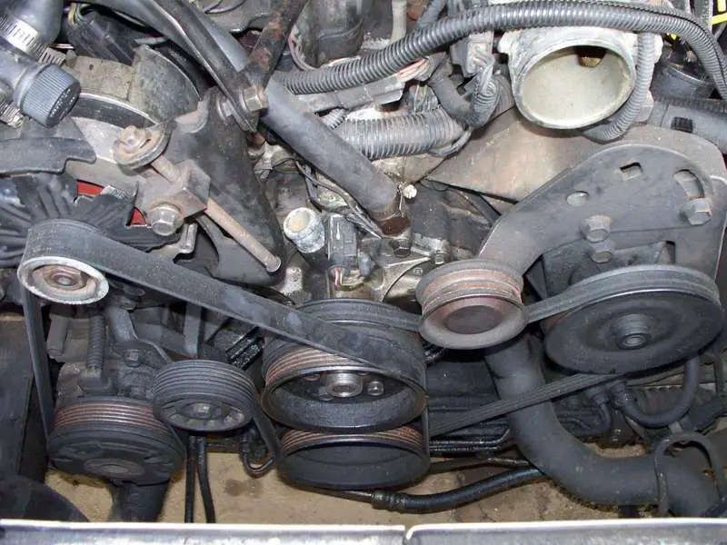 One_bolt_is_hidden_under_the_alternator_bracket_.jpg