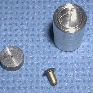puck, intermediate band valve and rivet