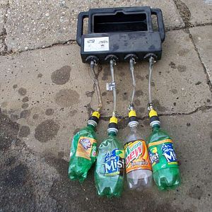 4 bottle drain pan with 4 separate valves.