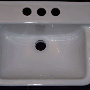 Crane model 1377V 15" X 12" wall hung sink.