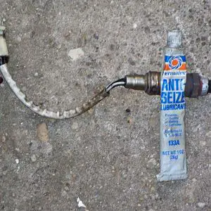 Oxygen sensor with anti-seize compound.