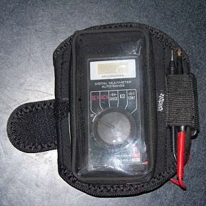 A multimeter is in the armband.