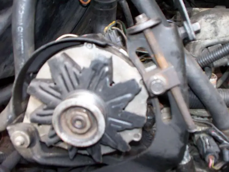 Alternator with adjuster.