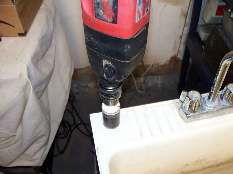 Drilling a 1 1/2" hole.