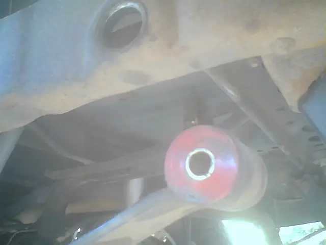 Frame-to-shackle bushing location outside