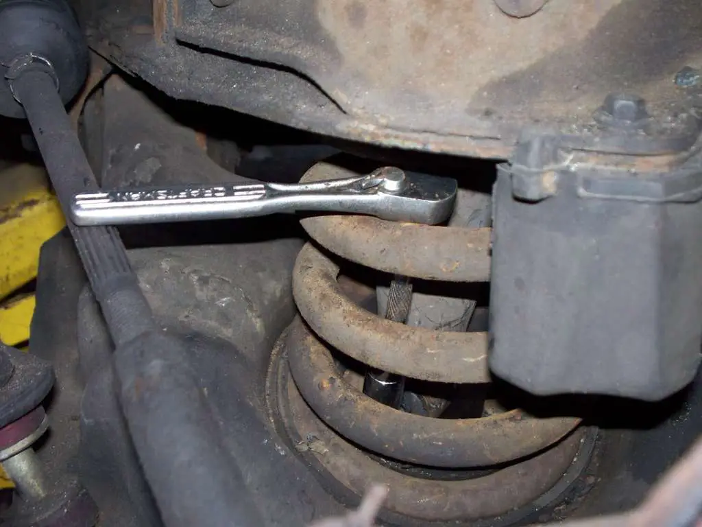 Hold the inner nut in place if it turns.