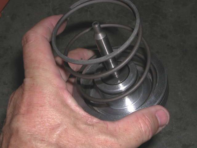 low reverse piston