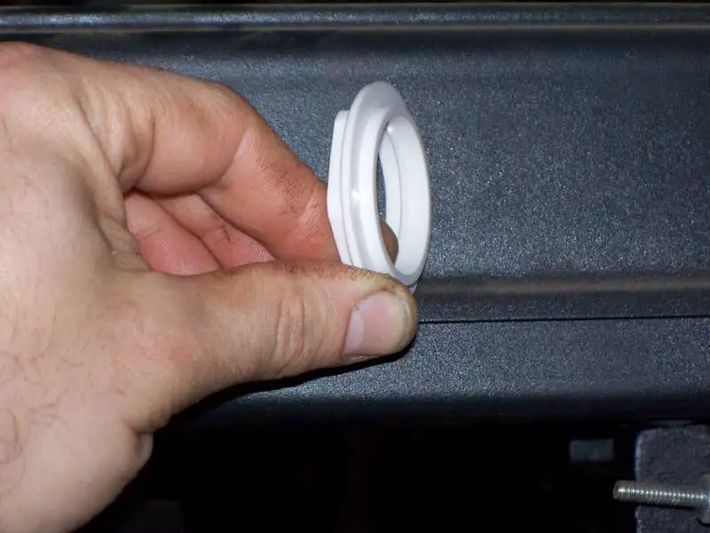 The retaining lock nut with a groove.