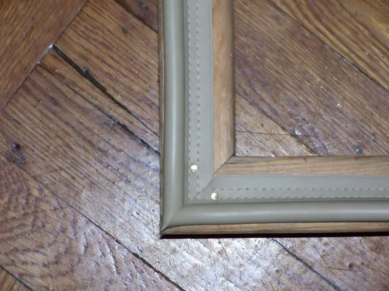 Two mitered corners of weatherstrip.
